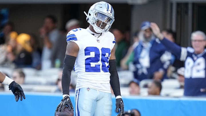 Dallas Cowboys cornerback DaRon Bland celebrates his score in the end zone against the Carolina Panthers.