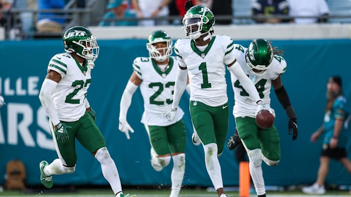Dec 15, 2024; Jacksonville, Florida, USA; New York Jets cornerback Sauce Gardner (1) celebrates after an interception against the Jacksonville Jaguars in the fourth quarter at EverBank Stadium. 