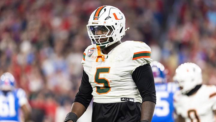 Jan 8, 2026; Glendale, AZ, USA; Miami Hurricanes defensive lineman Justin Scott (5) against the Mississippi Rebels during the 2026 Fiesta Bowl and semifinal game of the College Football Playoff at State Farm Stadium. Mandatory Credit: Mark J. Rebilas-Imagn Images