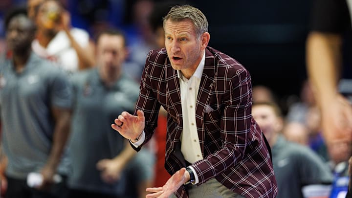 Jan 18, 2025; Lexington, Kentucky, USA; Alabama Crimson Tide head coach Nate Oats cheers on his team during the second half against the Kentucky Wildcats at Rupp Arena at Central Bank Center. Mandatory Credit: Jordan Prather-Imagn Images
