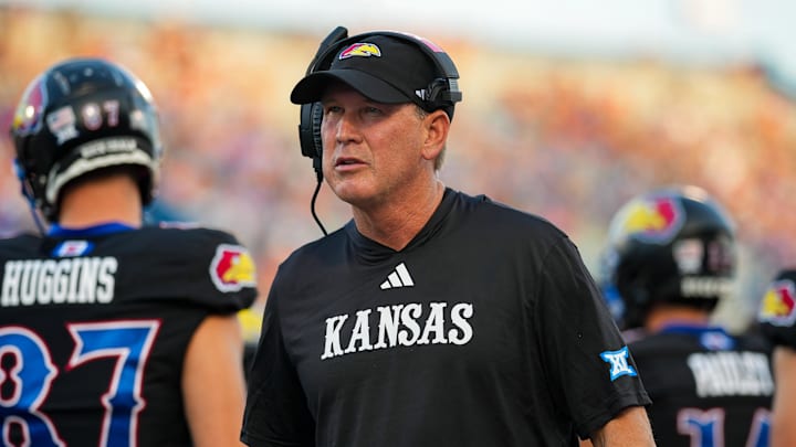 Sep 8, 2023; Lawrence, Kansas, USA; Kansas Jayhawks head coach Lance Leipold during a timeout in the first half against the Illinois Fighting Illini at David Booth Kansas Memorial Stadium. Mandatory Credit: Jay Biggerstaff-Imagn Images Sep 8, 2023; Lawrence, Kansas, USA; Kansas Jayhawks head coach Lance Leipold during a timeout in the first half against the Illinois Fighting Illini at David Booth Kansas Memorial Stadium. Mandatory Credit: Jay Biggerstaff-Imagn Images
