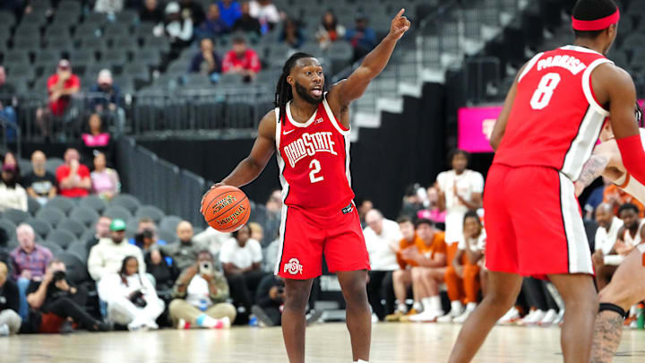 Nov 4, 2024; Las Vegas, Nevada, USA; Ohio State Buckeyes guard Bruce Thornton (2) directs a play against the Texas Longhorns during the second half at T-Mobile Arena. Mandatory Credit: Stephen R. Sylvanie-Imagn Images