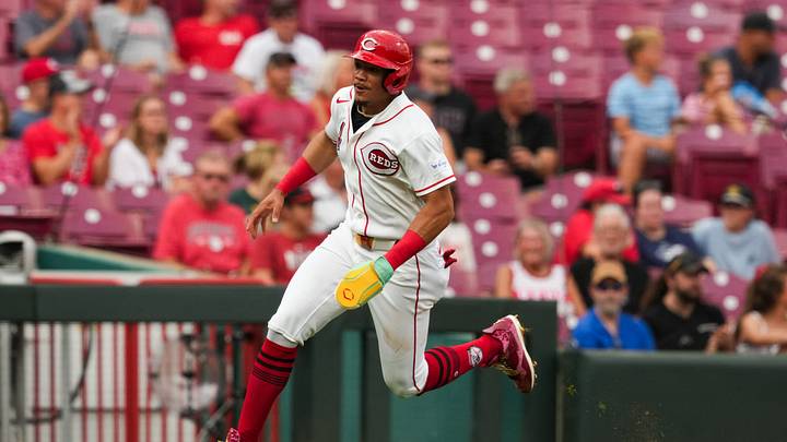 Aug 5, 2026; Cincinnati, Ohio, USA;  Cincinnati Reds outfielder Noelvi Marte scores a run on a single by catcher Jose Trevino during the game against the Athletics in the second inning at Great American Ball Park. Mandatory Credit: Aaron Doster-Imagn Images