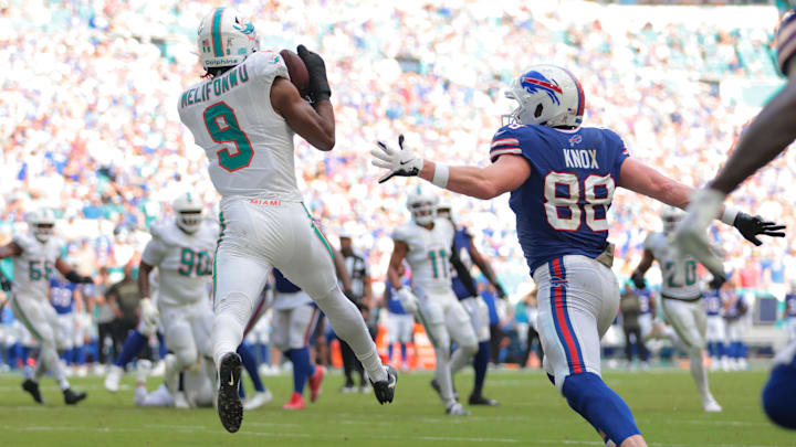 Miami Dolphins safety Ifeatu Melifonwu (9) makes an interception against Buffalo Bills tight end Dawson Knox (88) during the second half at Hard Rock Stadium.