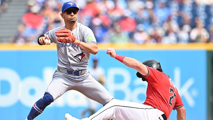 Sep 3, 2026: Toronto Blue Jays shortstop Andres Gimenez (0) forces out Cleveland Guardians catcher Austin Hedges (27) during the second inning at Progressive Field. Credit: Ken Blaze-Imagn Images