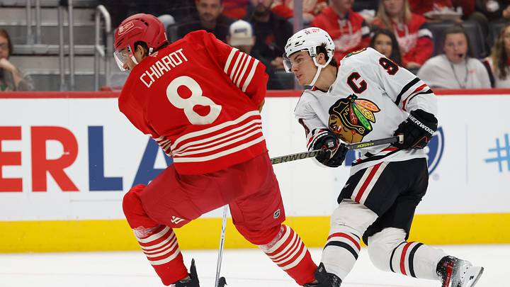 Oct 29, 2026; Detroit, Michigan, USA; Chicago Blackhawks center Connor Bedard (98) takes a shot defended by Detroit Red Wings defenseman Ben Chiarot (8) in the third period at Little Caesars Arena. Mandatory Credit: Rick Osentoski-Imagn Images Oct 29, 2026; Detroit, Michigan, USA; Chicago Blackhawks center Connor Bedard (98) takes a shot defended by Detroit Red Wings defenseman Ben Chiarot (8) in the third period at Little Caesars Arena. Mandatory Credit: Rick Osentoski-Imagn Images