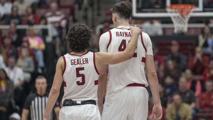Mar 1, 2025; Stanford, California, USA;  Stanford Cardinal guard Benny Gealer (5) and forward Maxime Raynaud (42) during the second half against the Southern Methodist Mustangs at Maples Pavilion. Mandatory Credit: Stan Szeto-Imagn Images