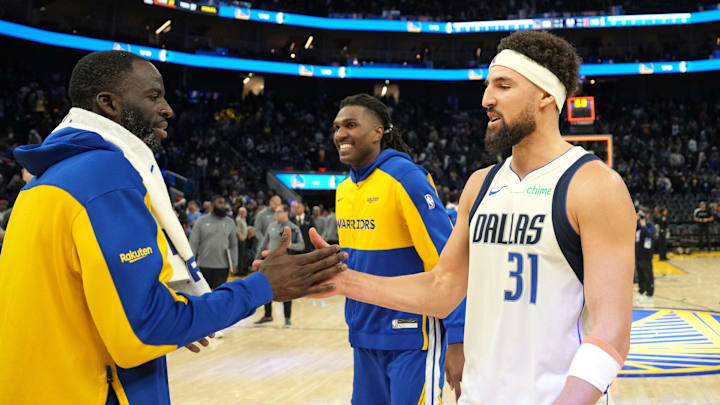 Dallas Mavericks guard Klay Thompson (31) greets Golden State Warriors forward Draymond Green (left) after the game at Chase Center on Dec. 15, 2024. Dallas Mavericks guard Klay Thompson (31) greets Golden State Warriors forward Draymond Green (left) after the game at Chase Center on Dec. 15, 2024.
