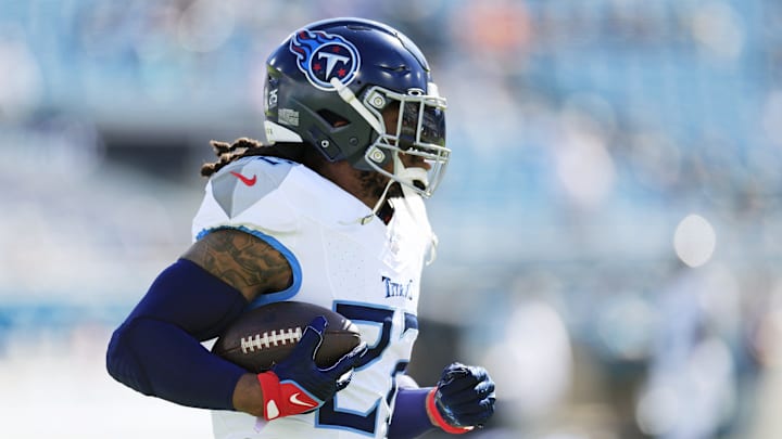 Tennessee Titans running back Derrick Henry (22) runs the ball before an NFL football matchup