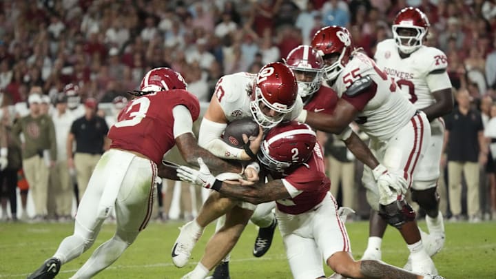Nov 15, 2025; Tuscaloosa, Alabama, USA; Alabama Crimson Tide defensive back Zabien Brown (2) and defensive back Keon Sabb (3) combine to tackle Oklahoma Sooners quarterback John Mateer (10) at Saban Field at Bryant-Denny Stadium. Oklahoma defeated Alabama 23-21. Mandatory Credit: Gary Cosby Jr.-Imagn Images Nov 15, 2025; Tuscaloosa, Alabama, USA; Alabama Crimson Tide defensive back Zabien Brown (2) and defensive back Keon Sabb (3) combine to tackle Oklahoma Sooners quarterback John Mateer (10) at Saban Field at Bryant-Denny Stadium. Oklahoma defeated Alabama 23-21. Mandatory Credit: Gary Cosby Jr.-Imagn Images