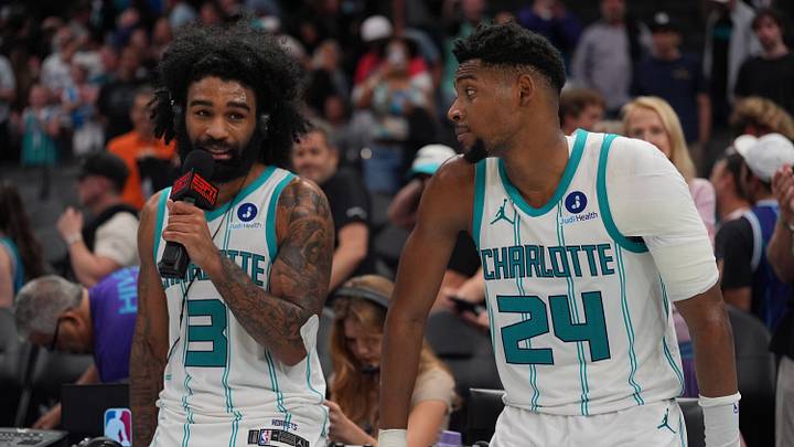 Apr 14, 2026; Charlotte, North Carolina, USA; Charlotte Hornets guard Coby White (3) alongside forward Brandon Miller (24) give an interview after the overtime win during the play-in rounds between the Charlotte Hornets and the Miami Heat of the 2026 NBA Playoffs at Spectrum Center. Mandatory Credit: Jim Dedmon-Imagn Images Apr 14, 2026; Charlotte, North Carolina, USA; Charlotte Hornets guard Coby White (3) alongside forward Brandon Miller (24) give an interview after the overtime win during the play-in rounds between the Charlotte Hornets and the Miami Heat of the 2026 NBA Playoffs at Spectrum Center. Mandatory Credit: Jim Dedmon-Imagn Images