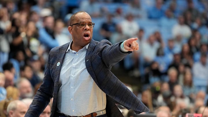 Mar 1, 2025; Chapel Hill, North Carolina, USA;  North Carolina Tar Heels head coach Hubert Davis reacts in the first half at Dean E. Smith Center. Mandatory Credit: Bob Donnan-Imagn Images