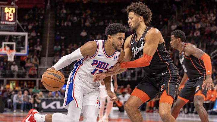 Nov 10, 2023; Detroit, Michigan, USA; Detroit Pistons guard Cade Cunningham (2) defends against Philadelphia 76ers forward Tobias Harris (12): David Reginek-Imagn Images