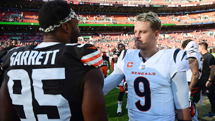 Oct 20, 2024; Cleveland, Ohio, USA; Cincinnati Bengals quarterback Joe Burrow (9) and Cleveland Browns defensive end Myles Garrett (95) talk after the game at Huntington Bank Field. Mandatory Credit: Ken Blaze-Imagn Images