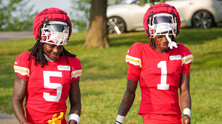 Jul 26, 2024; Kansas City, MO, USA; Kansas City Chiefs wide receiver Marquise “Hollywood”  Brown (5) and wide receiver Xavier Worthy (1) walk down the hill from the locker room to the fields during training camp at Missouri Western State University. Mandatory Credit: Denny Medley-Imagn Images
