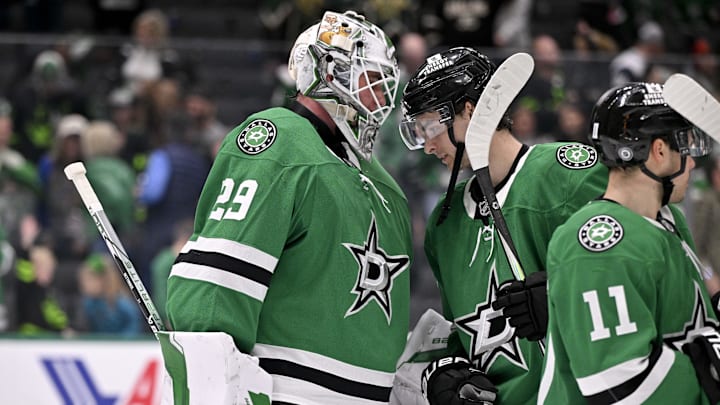 Mar 2, 2025; Dallas, Texas, USA; Dallas Stars goaltender Jake Oettinger (29) and center Wyatt Johnston (53) celebrate the win over the St. Louis Blues at the American Airlines Center. Mandatory Credit: Jerome Miron-Imagn Images