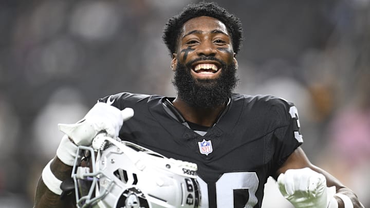 Las Vegas Raiders cornerback Nate Hobbs dances during warmup against the Dallas Cowboys at Allegiant Stadium.