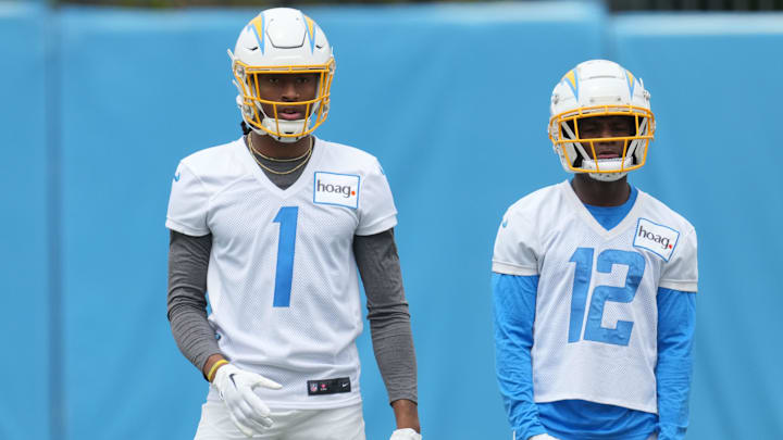May 12, 2023; Costa Mesa, CA, USA; Los Angeles Chargers receiver Quentin Johnston (1) and receiver Derius Davis (12) during rookie minicamp at Hoag Performance Center. Mandatory Credit: Kirby Lee-Imagn Images