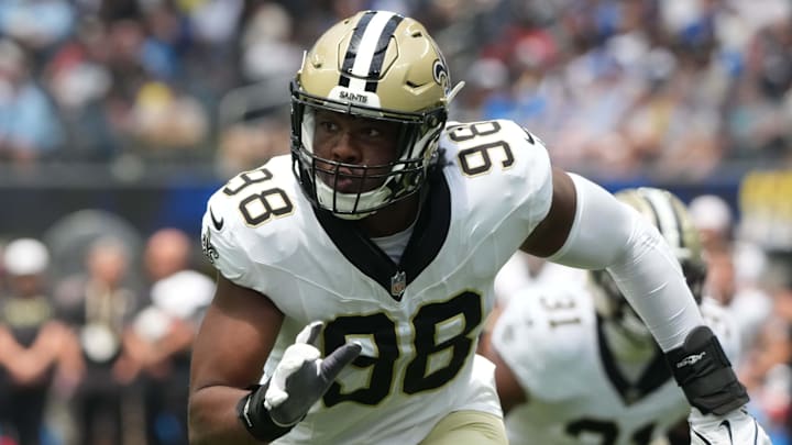 Aug 10, 2025; Inglewood, California, USA; New Orleans Saints defensive end Chris Rumph II (98) makes a play against the Los Angeles Chargers in the first half at SoFi Stadium. Mandatory Credit: Kirby Lee-Imagn Images