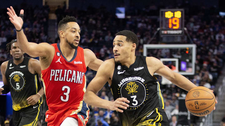 CJ McCollum guards Jordan Poole in the spring of 2023.