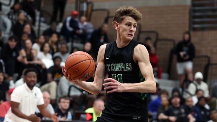 Jan 3, 2025; Gilbert, AZ, USA; Arizona Compass Prep guard Davis Fogle (11) against CIA Bella Vista (AZ) during the Hoophall West High School Invitational at Highland High School. Mandatory Credit: Mark J. Rebilas-Imagn Images