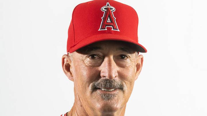 Feb 18, 2026; Tempe, AZ, USA; Los Angeles Angels pitching coach Mike Maddux poses for a portrait during photo day at Tempe Diablo Stadium.  Mandatory Credit: Mark J. Rebilas-Imagn Images