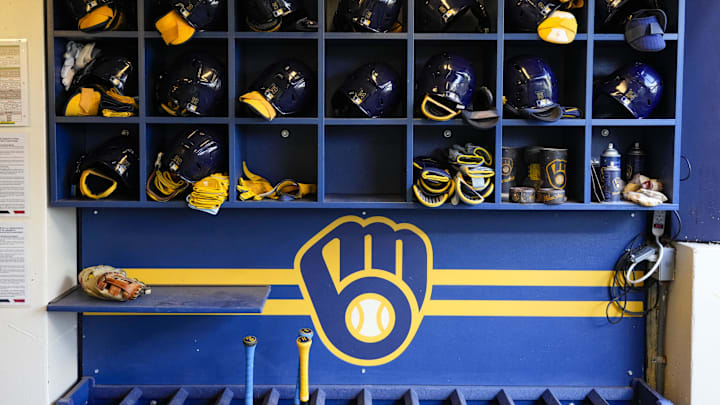 Sep 17, 2024; Milwaukee, Wisconsin, USA; General view of batting helmets inside the Milwaukee Brewers dugout prior to the game against the Philadelphia Phillies at American Family Field. Mandatory Credit: Jeff Hanisch-Imagn Images Sep 17, 2024; Milwaukee, Wisconsin, USA; General view of batting helmets inside the Milwaukee Brewers dugout prior to the game against the Philadelphia Phillies at American Family Field. Mandatory Credit: Jeff Hanisch-Imagn Images