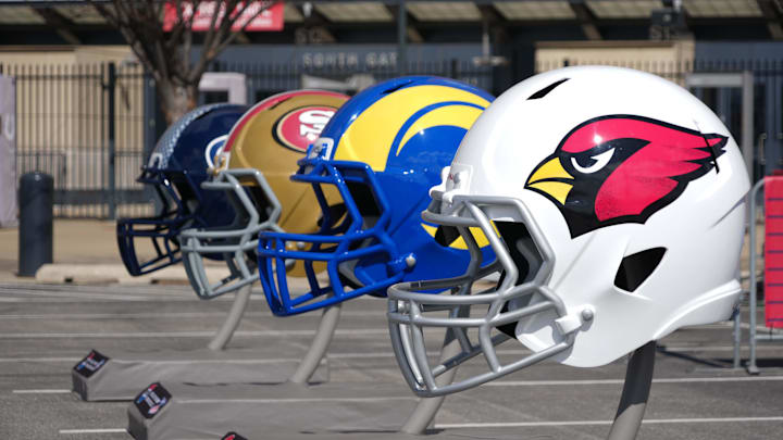 Feb 27, 2025; Indianapolis, IN, USA; NFC West helmets of the Arizona Cardinals, Los Angeles Rams, San Francisco 49ers and Seattle Seahawks at the 2025 NFL Scouting Combine Experience at Lucas Oil Stadium. Mandatory Credit: Kirby Lee-Imagn Images