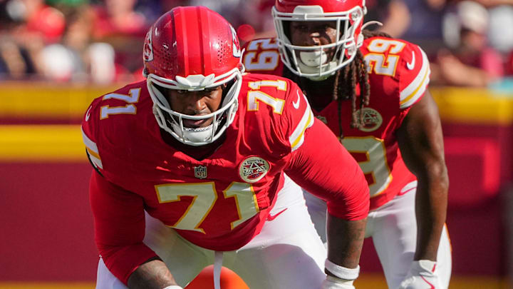 Sep 28, 2025; Kansas City, Missouri, USA; Kansas City Chiefs offensive tackle Josh Simmons (71) and running back Kareem Hunt (29) line up against the Baltimore Ravens during the game at GEHA Field at Arrowhead Stadium. Mandatory Credit: Denny Medley-Imagn Images
