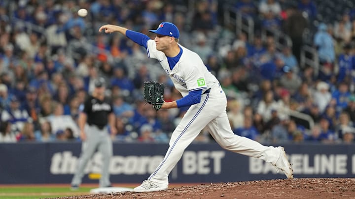 Sep 27, 2024; Toronto, Ontario, CAN; Toronto Blue Jays relief pitcher Brett de Geus (31) throws a pitch against the Miami Marlins during the seventh inning at Rogers Centre. Sep 27, 2024; Toronto, Ontario, CAN; Toronto Blue Jays relief pitcher Brett de Geus (31) throws a pitch against the Miami Marlins during the seventh inning at Rogers Centre.
