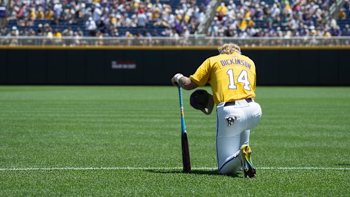 Jun 22, 2025; Omaha, Neb, USA;  LSU Tigers second baseman Daniel Dickinson (14) on the field before the game against the Coastal Carolina Chanticleers at Charles Schwab Field. Mandatory Credit: Steven Branscombe-Imagn Images