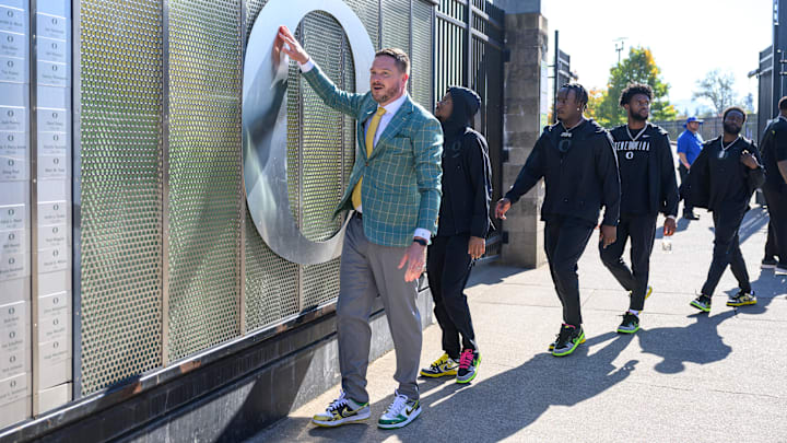 Oct 12, 2024; Eugene, Oregon, USA; Oregon Ducks head coach Dan Lanning touches the O during the walk-in before the game against the Ohio State Buckeyes at Autzen Stadium.