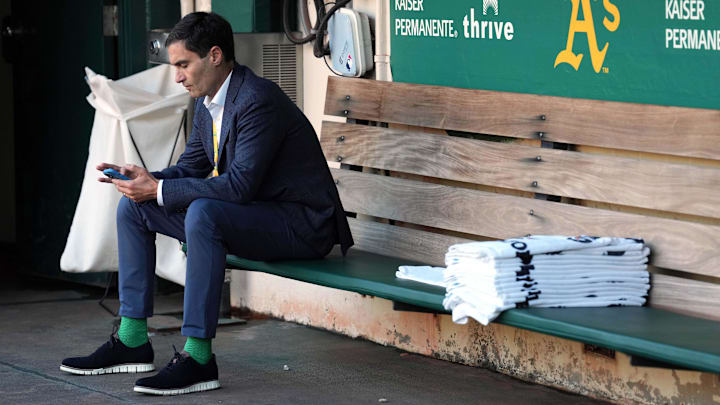 Sep 23, 2022; Oakland, California, USA; Oakland Athletics president Dave Kaval sits in the dugout before the game against the New York Mets at RingCentral Coliseum. Mandatory Credit: Darren Yamashita-Imagn Images Sep 23, 2022; Oakland, California, USA; Oakland Athletics president Dave Kaval sits in the dugout before the game against the New York Mets at RingCentral Coliseum. Mandatory Credit: Darren Yamashita-Imagn Images