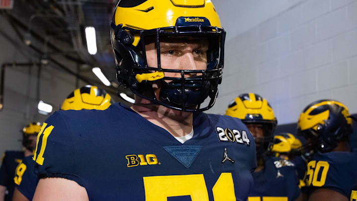 Jan 8, 2024; Houston, TX, USA; Michigan Wolverines offensive lineman Evan Link (71) against the Washington Huskies during the 2024 College Football Playoff national championship game at NRG Stadium. Mandatory Credit: Mark J. Rebilas-USA TODAY Sports