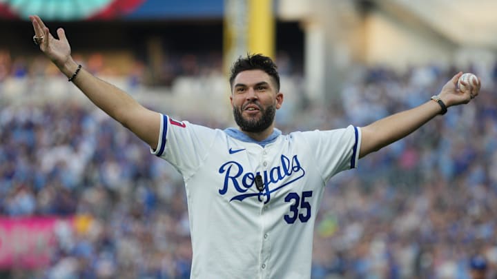 Oct 9, 2024; Kansas City, Missouri, USA; Form Kansas City Royals player Eric Hosmer throws out the cerominal first pitch before the game between the New York Yankees and the Kansas City Royals during game three of the NLDS for the 2024 MLB Playoffs at Kauffman Stadium. Mandatory Credit: Jay Biggerstaff-Imagn Images
