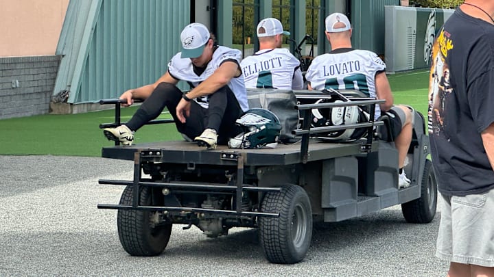Braden Mann (left) gets a lift from his special team teammates Jake Elliott and Rick Lovato.