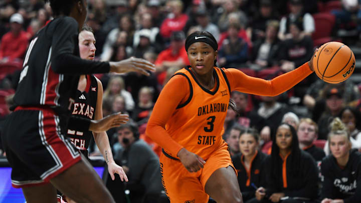 Oklahoma State's Micah Gray dribbles against Texas Tech in a Big 12 women's basketball game Saturday, Jan. 25, 2025, at United Supermarkets Arena.