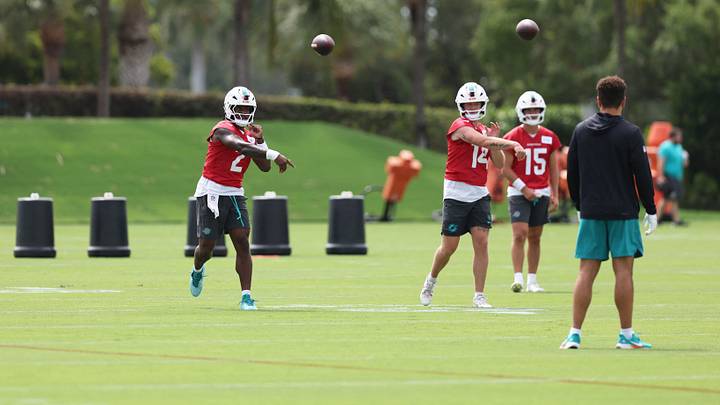 Miami Dolphins quarterback Malik Willis (2) and backup quarterback Quinn Ewers (14) throwing during mini camp with Cam Miller (15) observing at the Baptist Health Training Complex. Miami Dolphins quarterback Malik Willis (2) and backup quarterback Quinn Ewers (14) throwing during mini camp with Cam Miller (15) observing at the Baptist Health Training Complex.