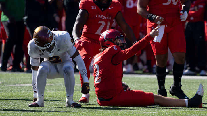 Cincinnati Bearcats quarterback Brendan Sorsby (2) gestures after running for a first down in the fourth quarter of the College Football game against the Arizona State Sun Devils at Nippert Stadium in Cincinnati on Saturday, Oct. 19, 2024.