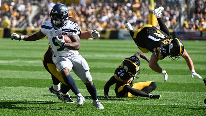 Sep 14, 2025; Pittsburgh, Pennsylvania, USA; Seattle Seahawks running back Kenneth Walker III (9) scores a touchdown  in front of Pittsburgh Steelers defenders Brandin Echols (26) and Payton Wilson (41) during the second half at Acrisure Stadium. Mandatory Credit: Barry Reeger-Imagn Images