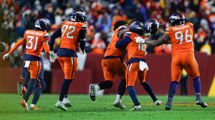 Nov 30, 2025; Landover, Maryland, USA; The Denver Broncos celebrate after the game against the Washington Commanders at Northwest Stadium. 