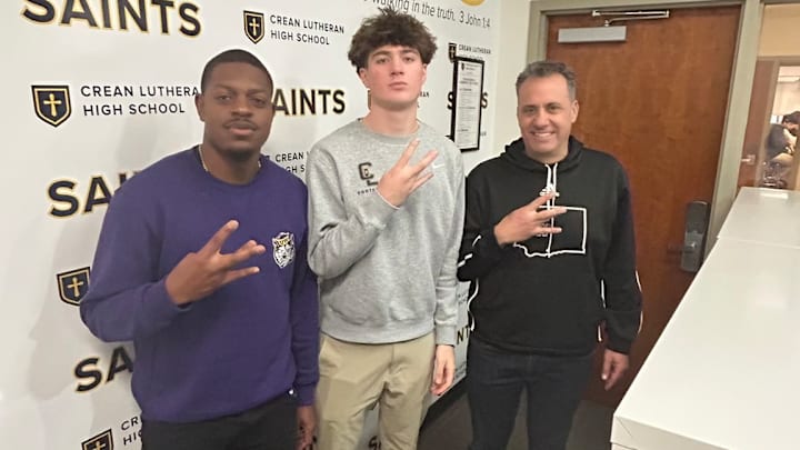 Caden Jones, QB recruit, meets with UW coaches John Richardson and Jedd Fisch rcently. 