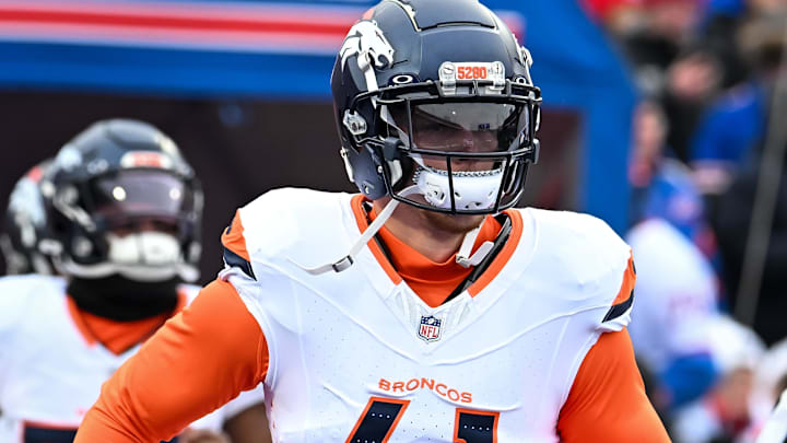 Jan 12, 2025; Orchard Park, New York, USA; Denver Broncos linebacker Drew Sanders (41) enters the field before an AFC wild card game against the Buffalo Bills at Highmark Stadium. Mandatory Credit: Mark Konezny-Imagn Images