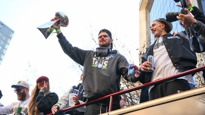 Feb 11, 2026; Seattle, WA, USA; Seattle Seahawks quarterback Sam Darnold (14) interacts with fans during the Super Bowl LX World Champions parade in downtown Seattle. Mandatory Credit: Steven Bisig-Imagn Images Feb 11, 2026; Seattle, WA, USA; Seattle Seahawks quarterback Sam Darnold (14) interacts with fans during the Super Bowl LX World Champions parade in downtown Seattle. Mandatory Credit: Steven Bisig-Imagn Images
