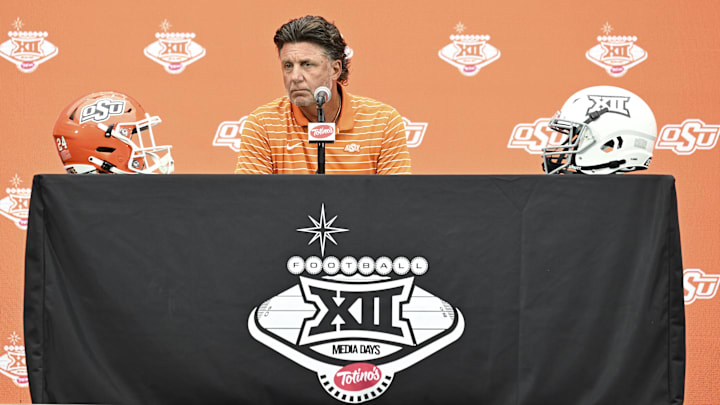 Jul 9, 2024; Las Vegas, NV, USA; Oklahoma State Cowboys head coach Mike Gundy speaks to the media during the Big 12 Media Days at Allegiant Stadium. Mandatory Credit: Candice Ward-Imagn Images Jul 9, 2024; Las Vegas, NV, USA; Oklahoma State Cowboys head coach Mike Gundy speaks to the media during the Big 12 Media Days at Allegiant Stadium. Mandatory Credit: Candice Ward-Imagn Images