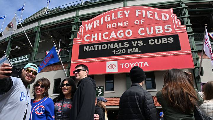 Mar 28, 2026; Chicago, Illinois, USA; Fans take a selfie in front of the marquee prior to a game between the Washington Nationals and the Chicago Cubs at Wrigley Field. Mandatory Credit: Patrick Gorski-Imagn Images Mar 28, 2026; Chicago, Illinois, USA; Fans take a selfie in front of the marquee prior to a game between the Washington Nationals and the Chicago Cubs at Wrigley Field. Mandatory Credit: Patrick Gorski-Imagn Images