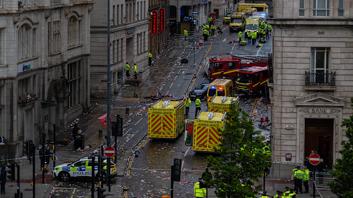 Nearly 50 people were injured by a car driving into a crowd at Liverpool’s Premier League trophy parade.