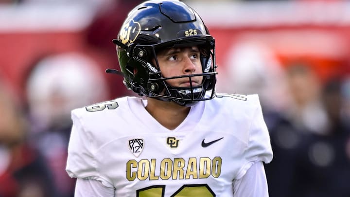 Nov 25, 2023; Salt Lake City, Utah, USA; Colorado Buffaloes place kicker Alejandro Mata (16) looks at the goal post before a kick for extra points against the Utah Utes at Rice-Eccles Stadium. Mandatory Credit: Christopher Creveling-Imagn Images