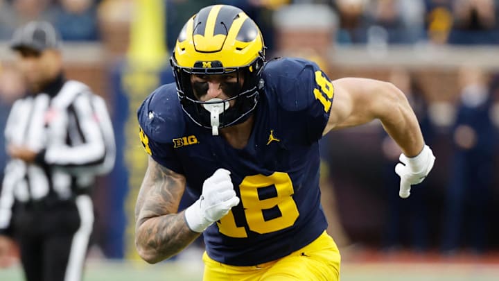 Nov 23, 2024; Ann Arbor, Michigan, USA;  Michigan Wolverines tight end Colston Loveland (18) runs a route against the Northwestern Wildcats at Michigan Stadium. Mandatory Credit: Rick Osentoski-Imagn Images