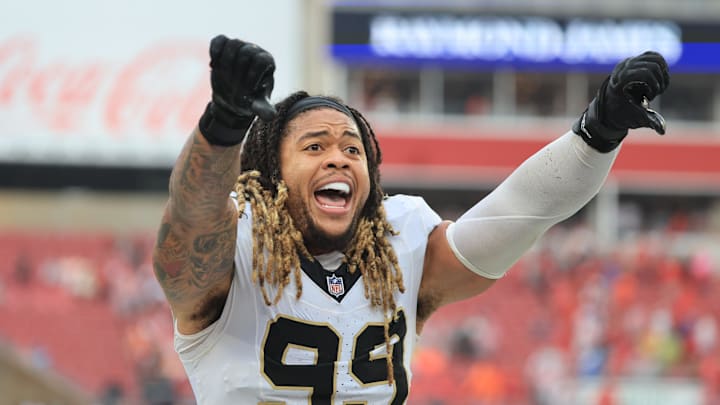 Dec 7, 2025; Tampa, Florida, USA; New Orleans Saints defensive end Chase Young (99) reacts after defeating the Tampa Bay Buccaneers at Raymond James Stadium. Mandatory Credit: Kim Klement Neitzel-Imagn Images